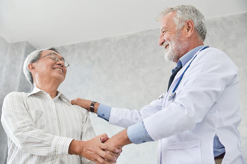 doctor shaking patient hand